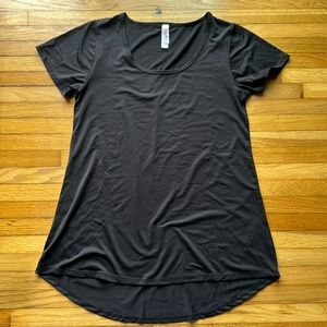 Lularoe Black scoop neck t shirt. Size XXSmall. Runs big. Longer in back.